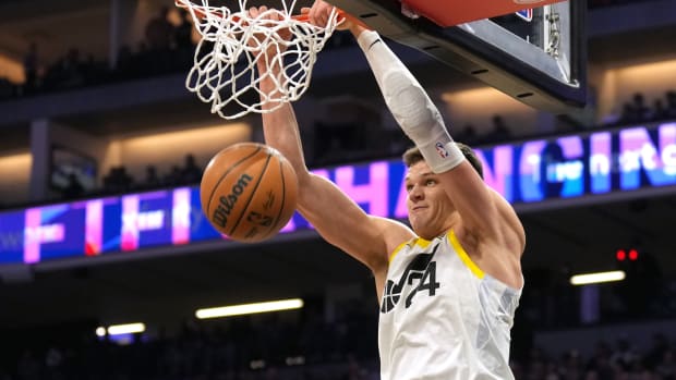 Utah Jazz center Walker Kessler (24) dunks against the Sacramento Kings during the third quarter at Golden 1 Center.